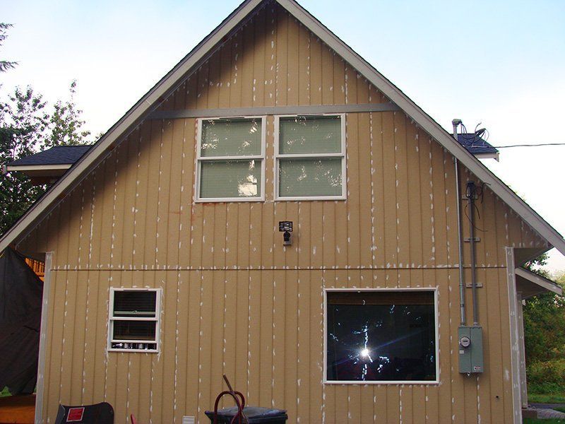 Before painting the side of a house