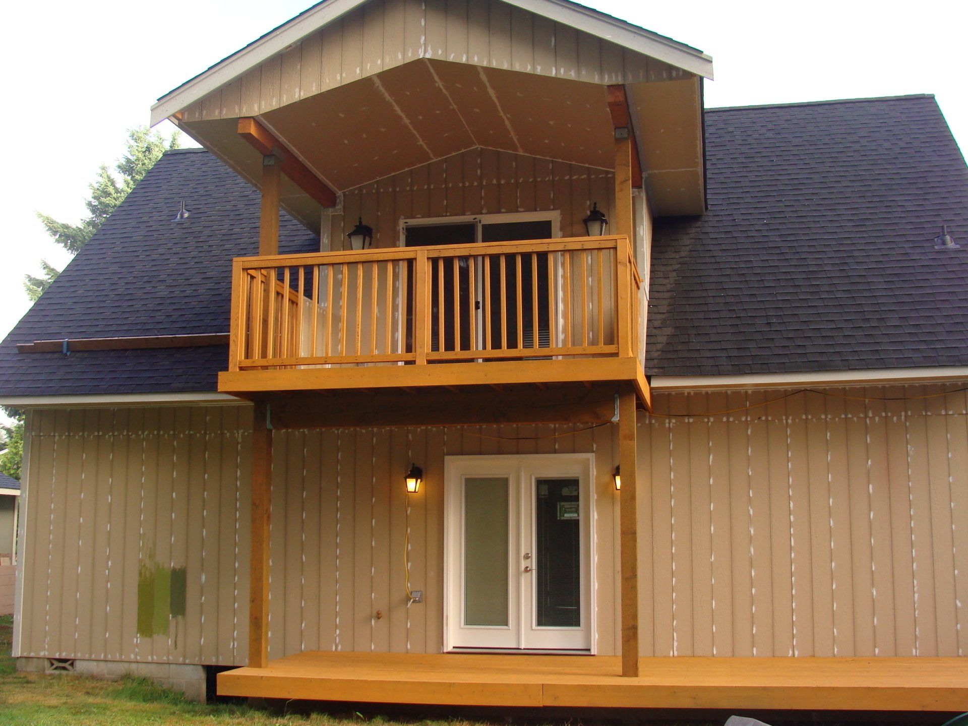 Before painting a house with balcony