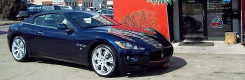 Sports car outside El Diamante Hand Car Wash & Detailing shop