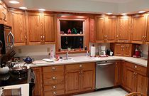 Kitchen with wood cabinets