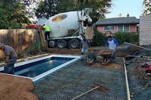 Workers placing gravel