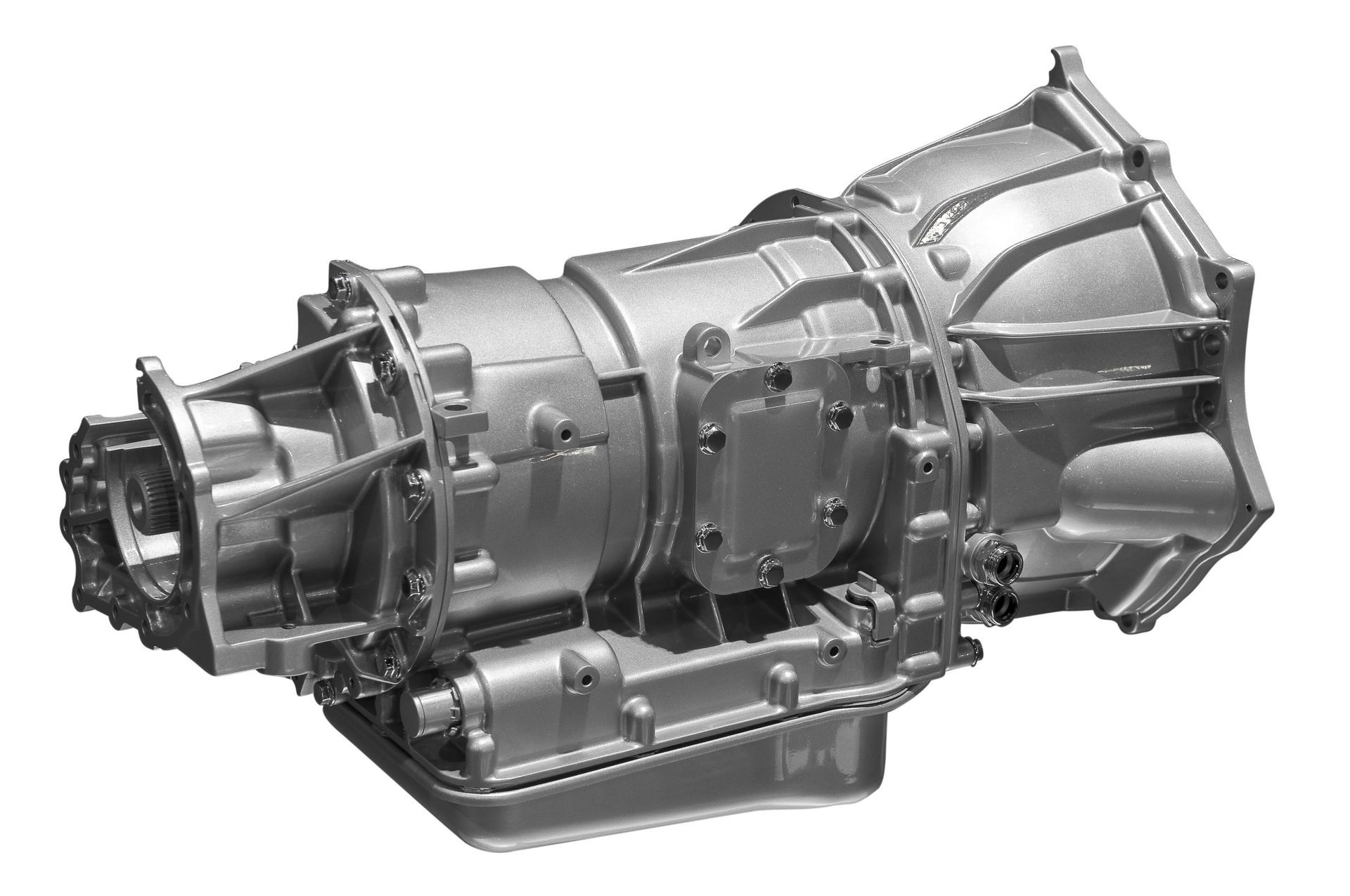 Silver car transmission assembly on a white background