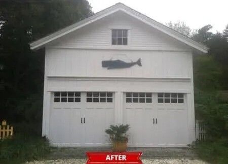 White garage with fish sign on the front and a red “AFTER” label below