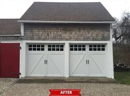 Two white garage doors on a gray shingle building, with a red side door and an “AFTER” label below.