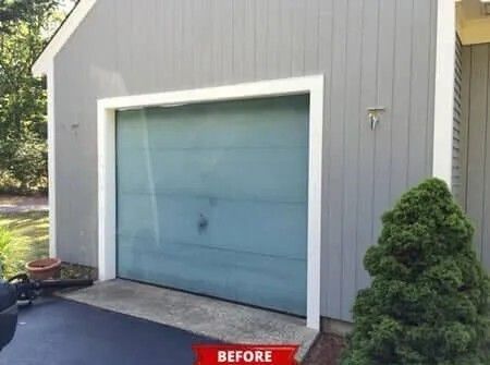 Gray garage with a blue door and white trim beside a dark driveway, labeled “BEFORE”