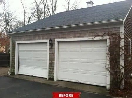 Before photo of a detached garage with two white doors and gray siding, one door damaged and covered in vines