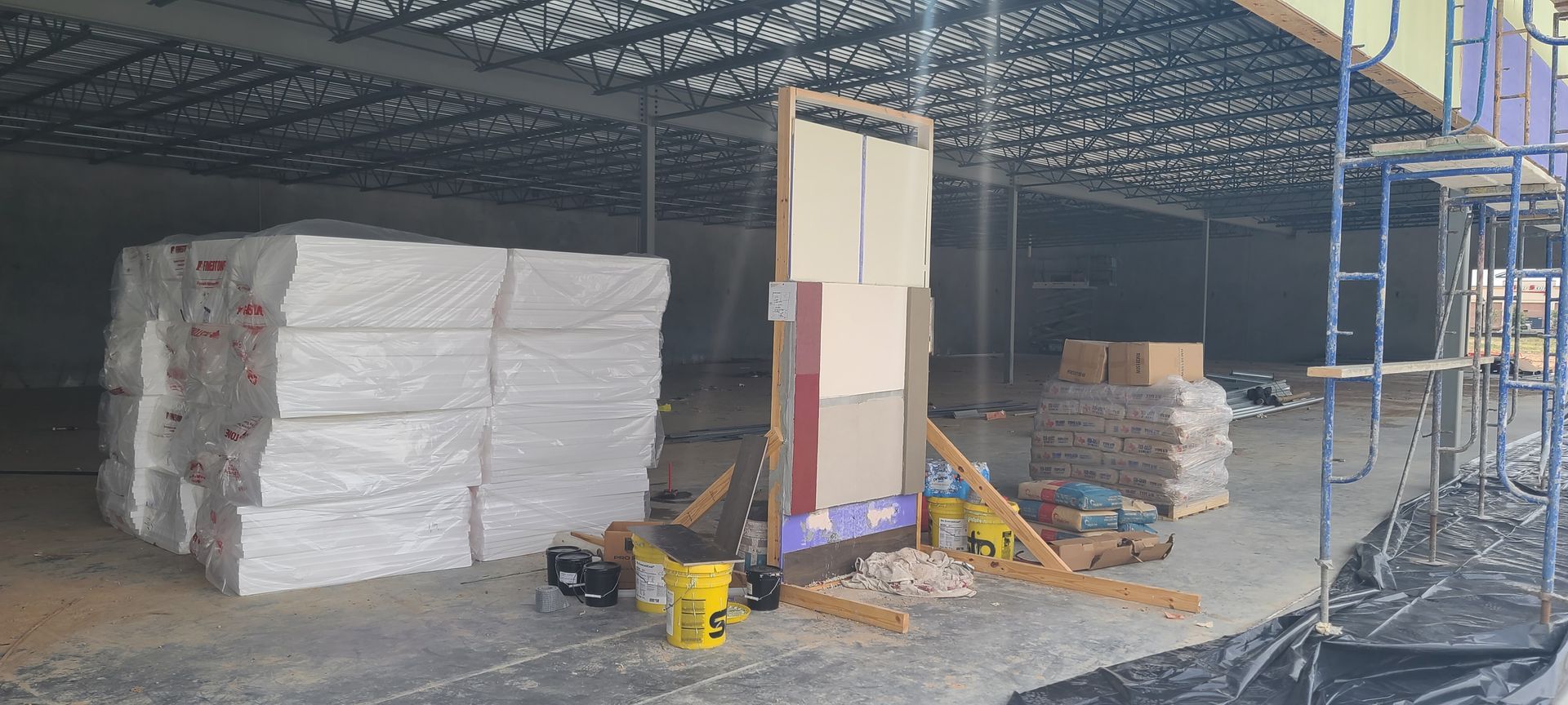 A large building under construction with a lot of scaffolding.