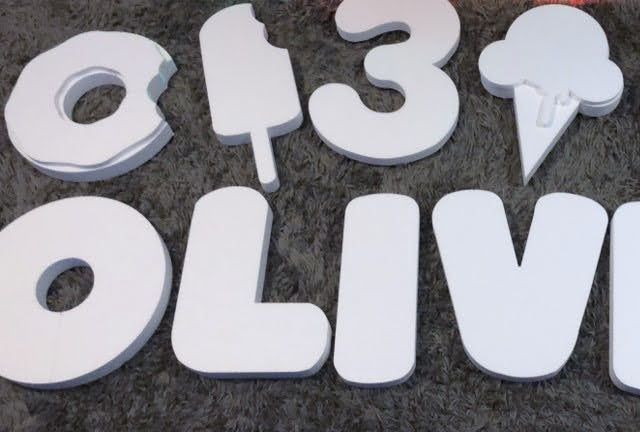 The word olivia is made of styrofoam letters