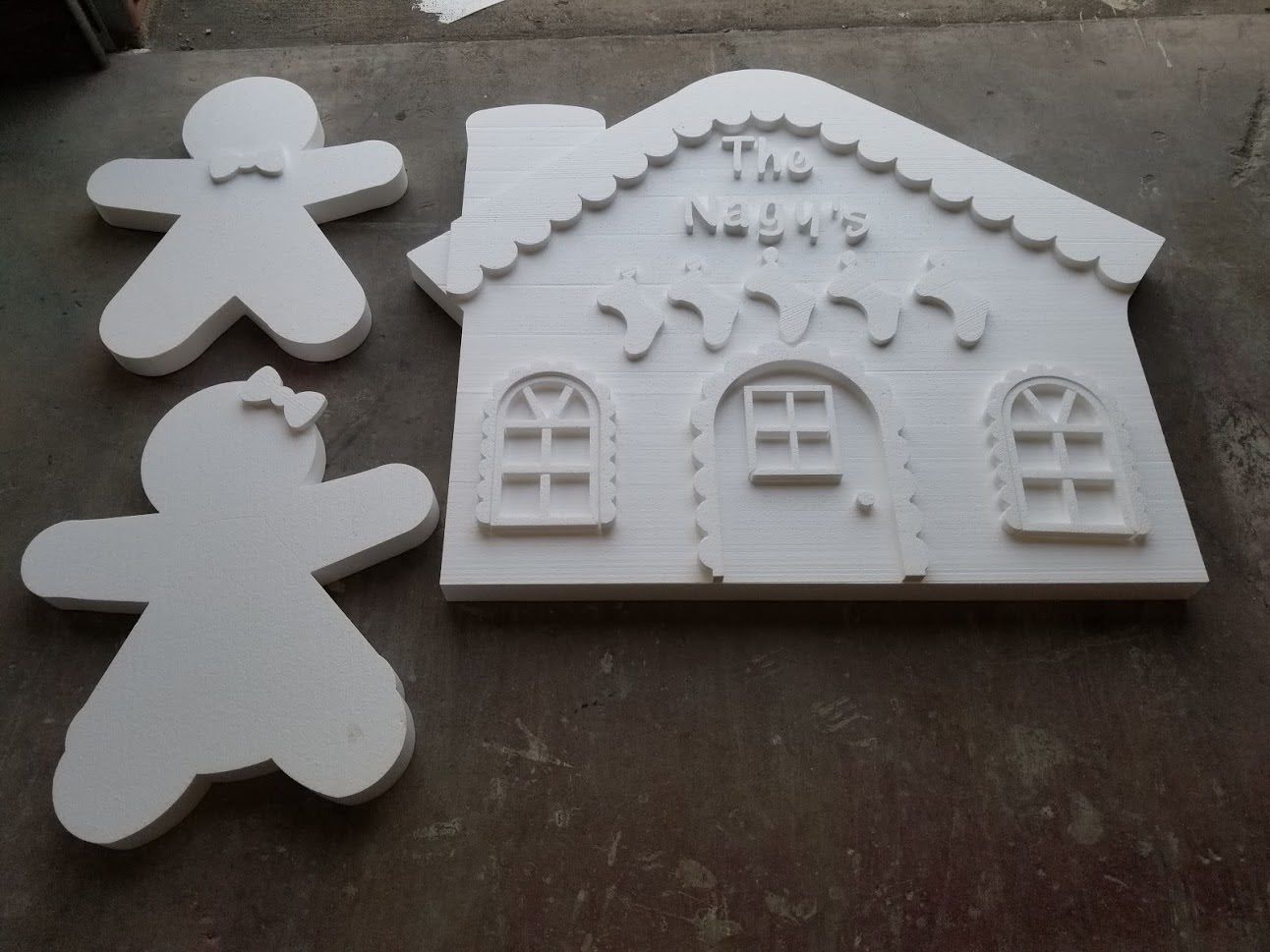 A gingerbread house is made out of styrofoam