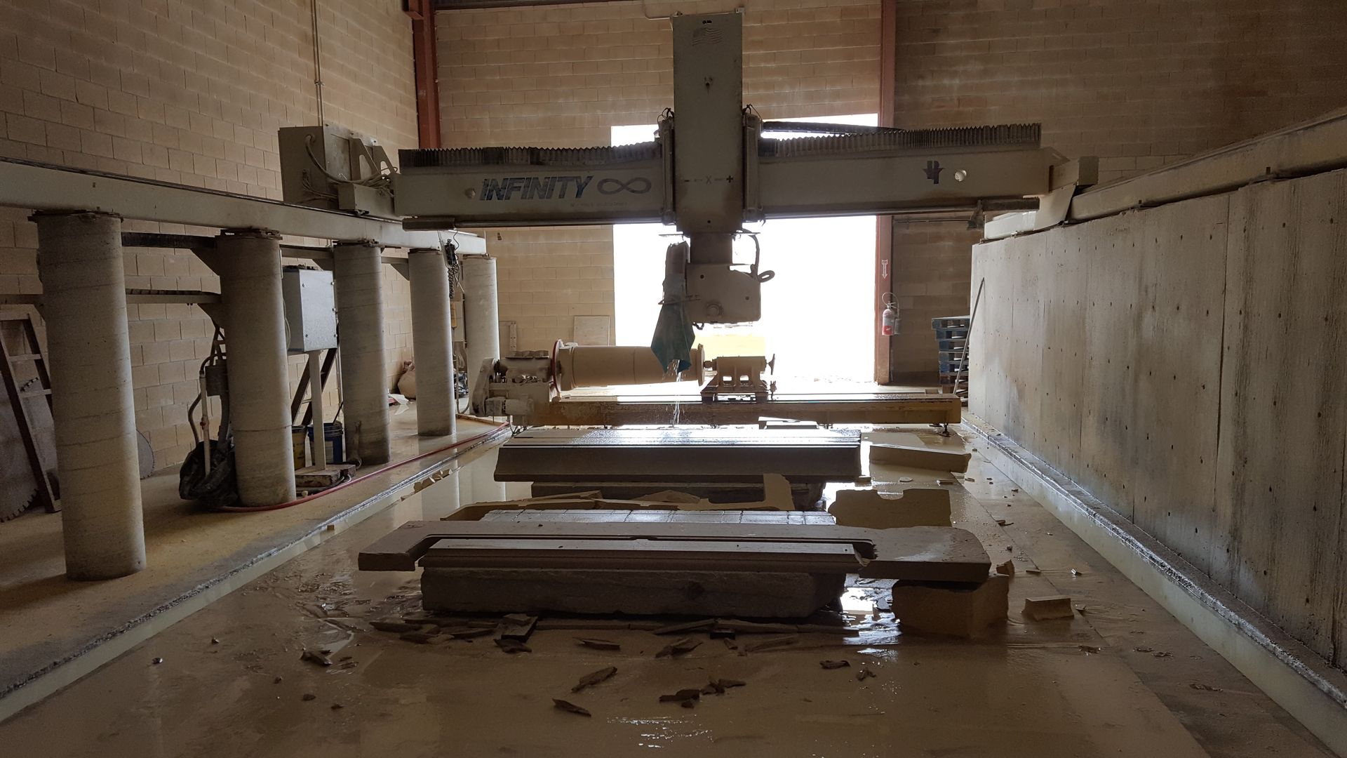 A large machine in a room with the word army on it