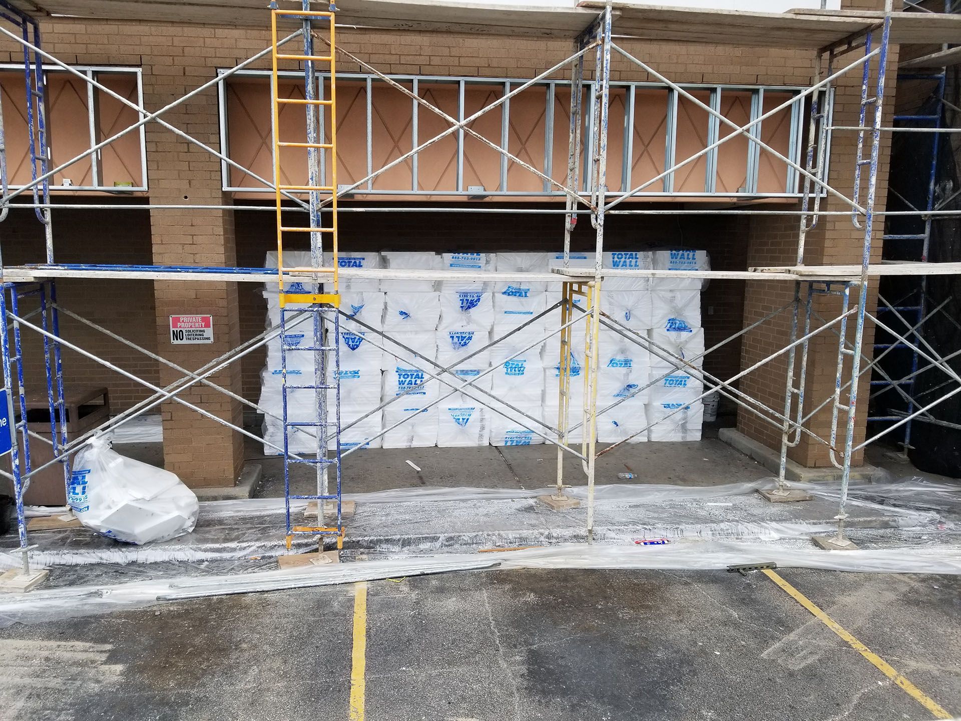 A building under construction with scaffolding around it