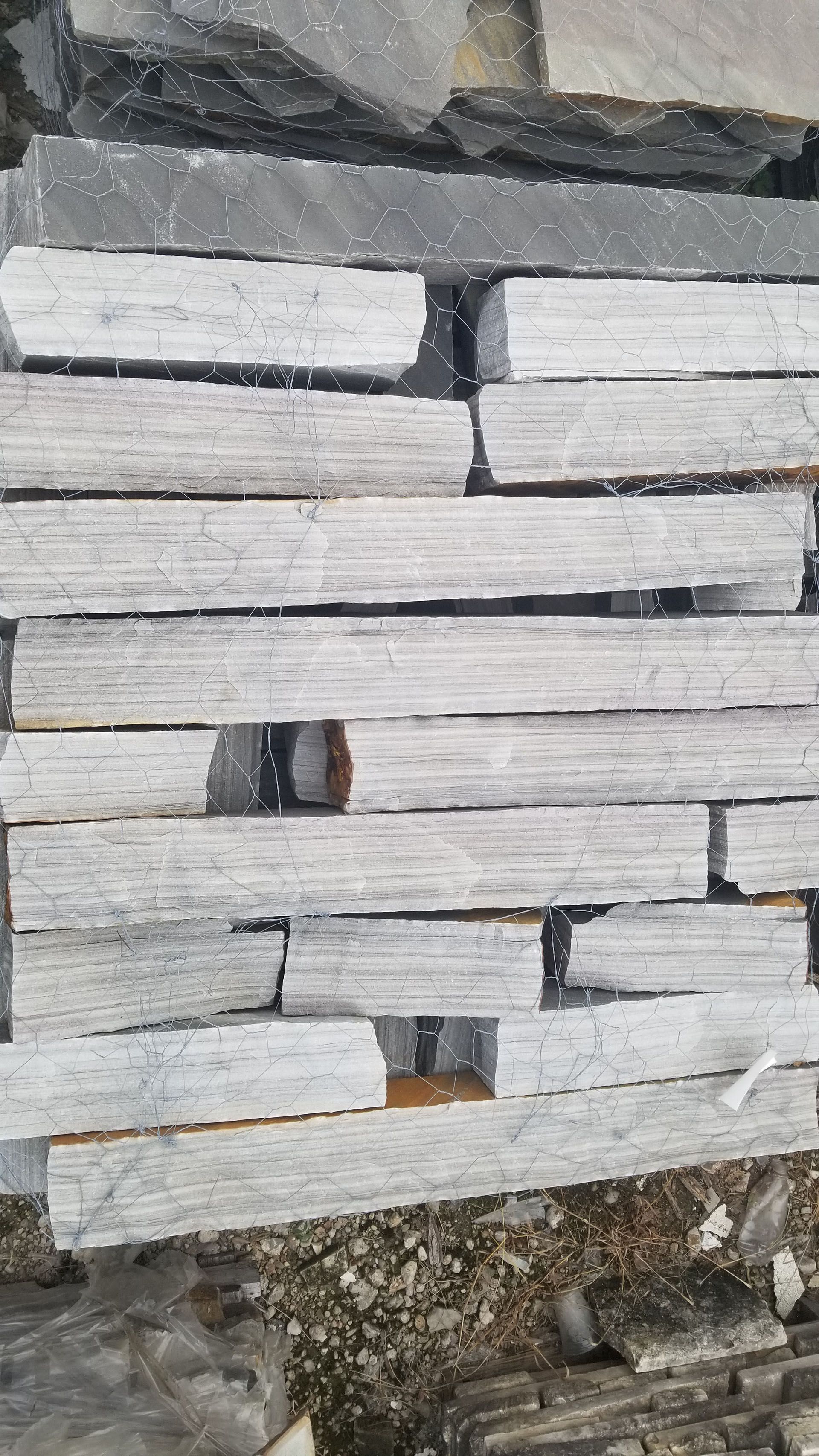 A close up of a stack of bricks sitting on top of each other.