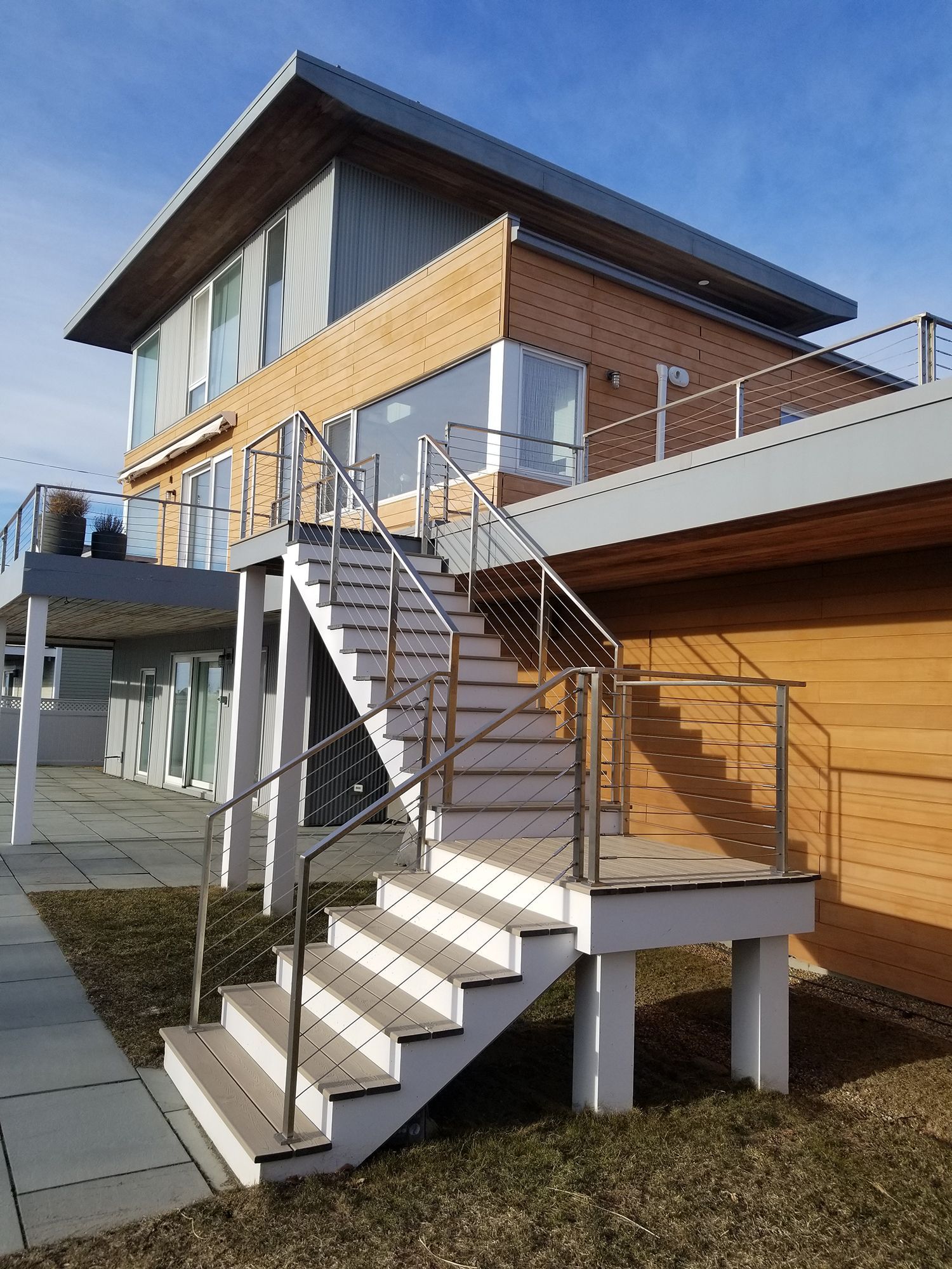 Composite deck with stainless steel railing