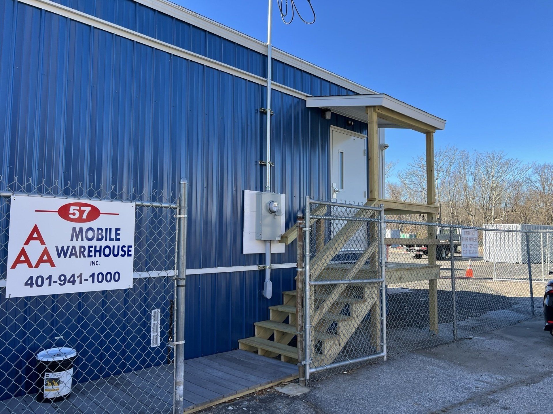 blue trailer and a porch