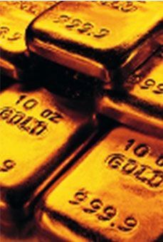 A bunch of gold bars stacked on top of each other