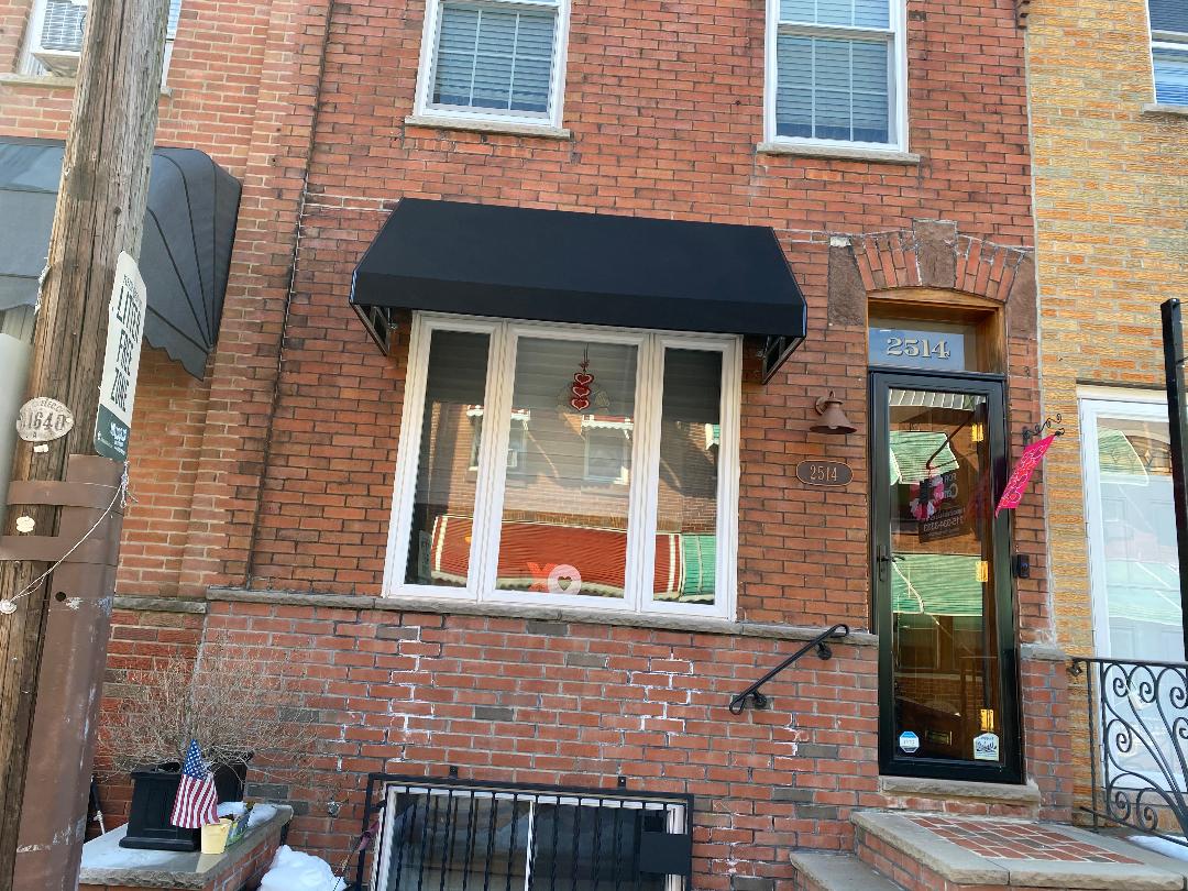 black canvas window awning