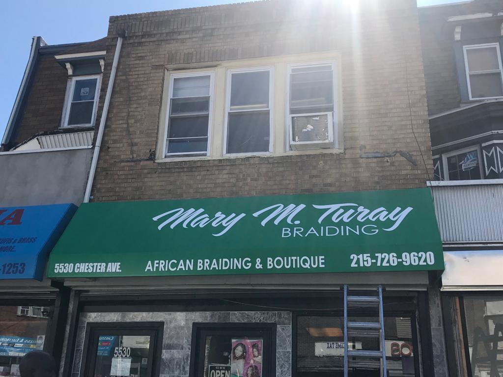 green commercial awning