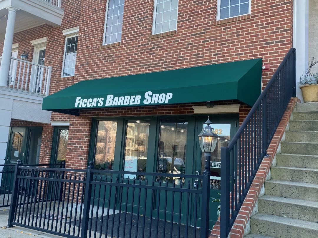 green canvas barber shop awning