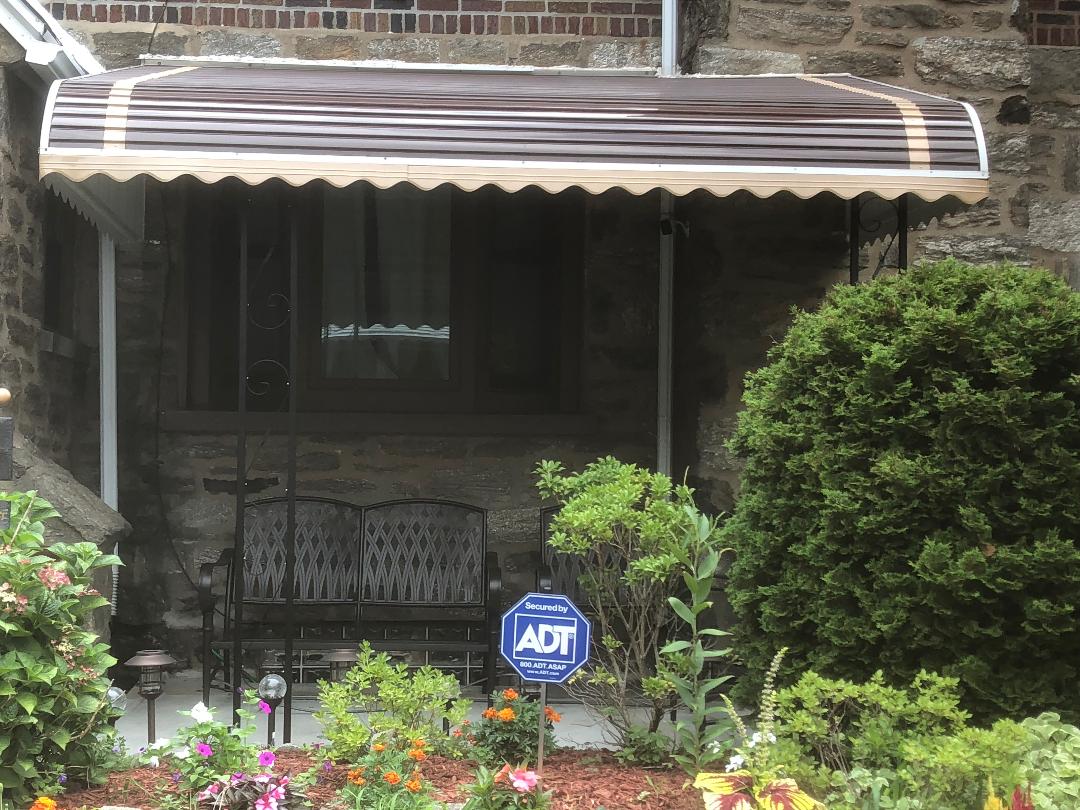 brown aluminum awning