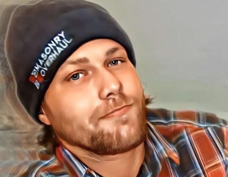 Man wearing a beanie with the words 