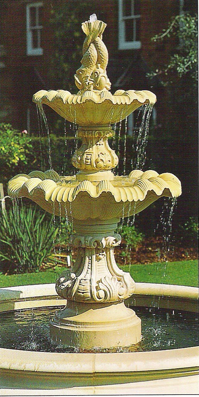 A large fountain with a statue on top of it