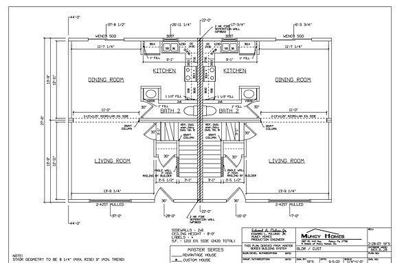 Architectural floor plan showing two mirror-image residential units with living rooms, kitchens, and stairs.