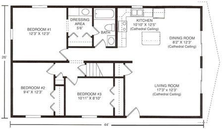 Floor plan of a rectangular house showing three bedrooms, a bathroom with a dressing area, kitchen, and living/dining room.