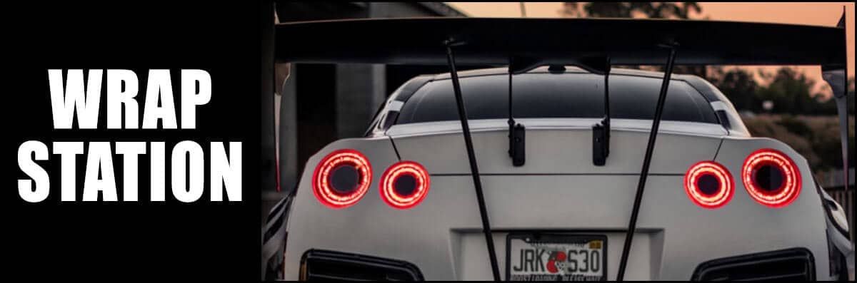 A picture of a car with the words wrap station on it