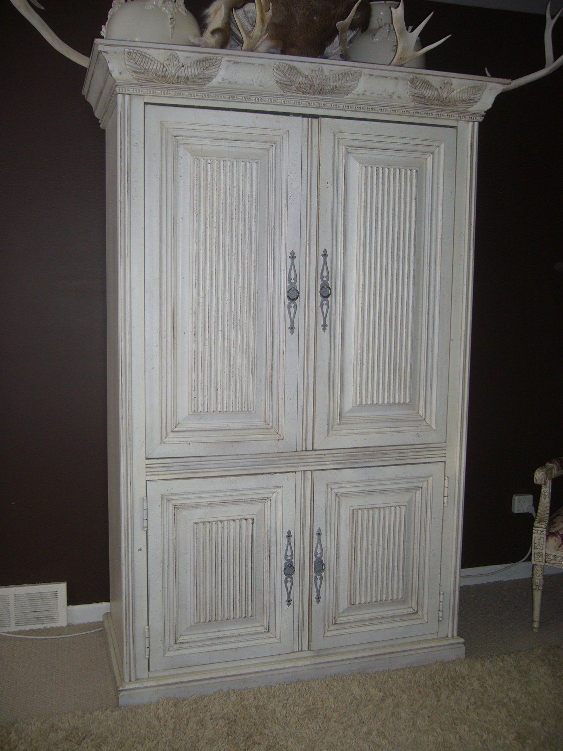 Antique tall white cabinet