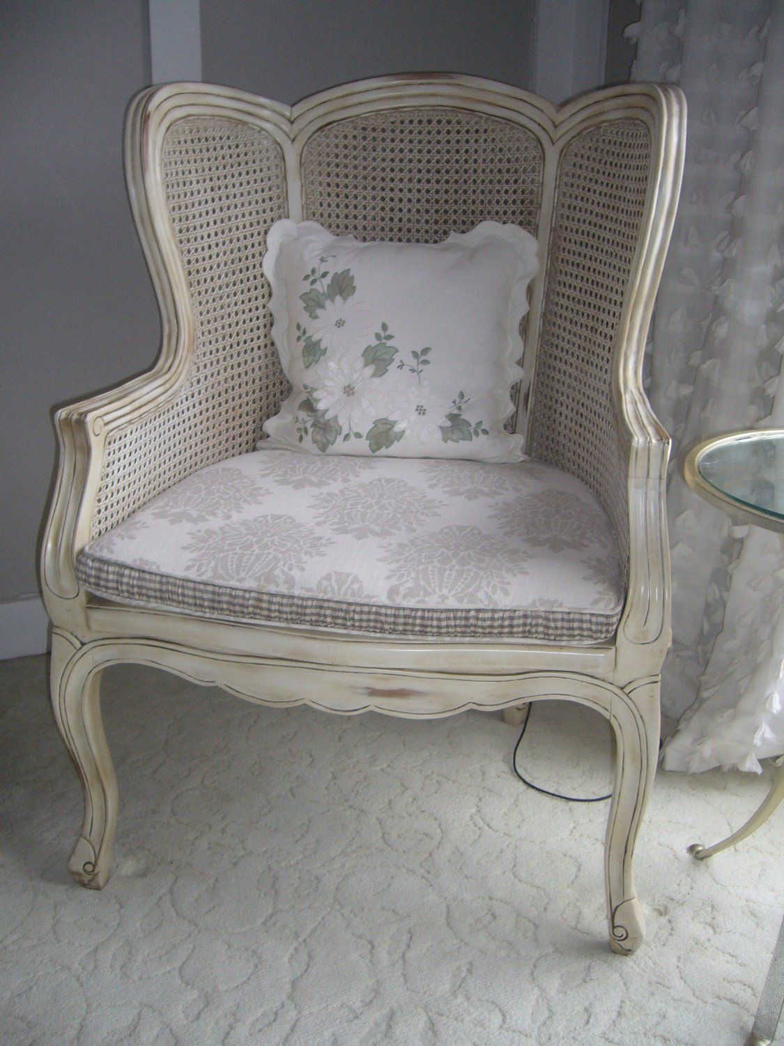 Antique white chair with pillow