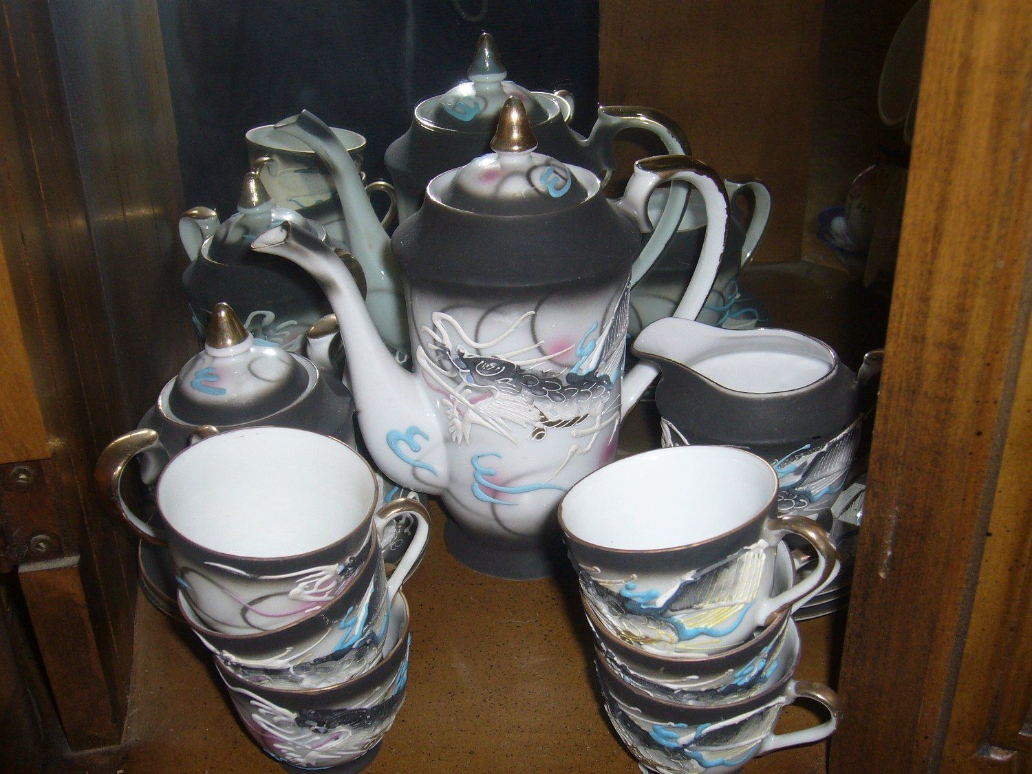 Antique kettle and tea cups