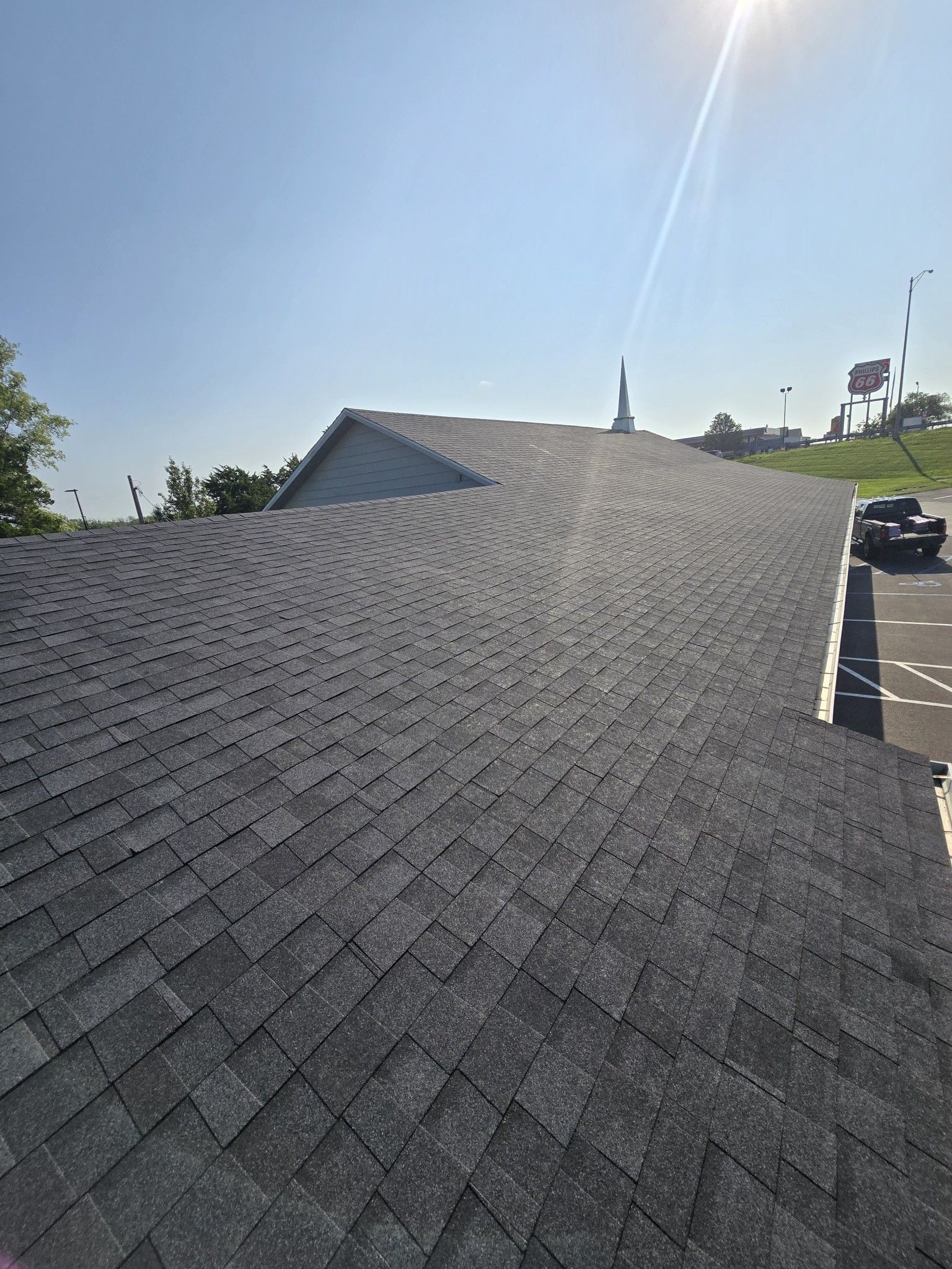 The roof of a building with a lot of shingles on it.