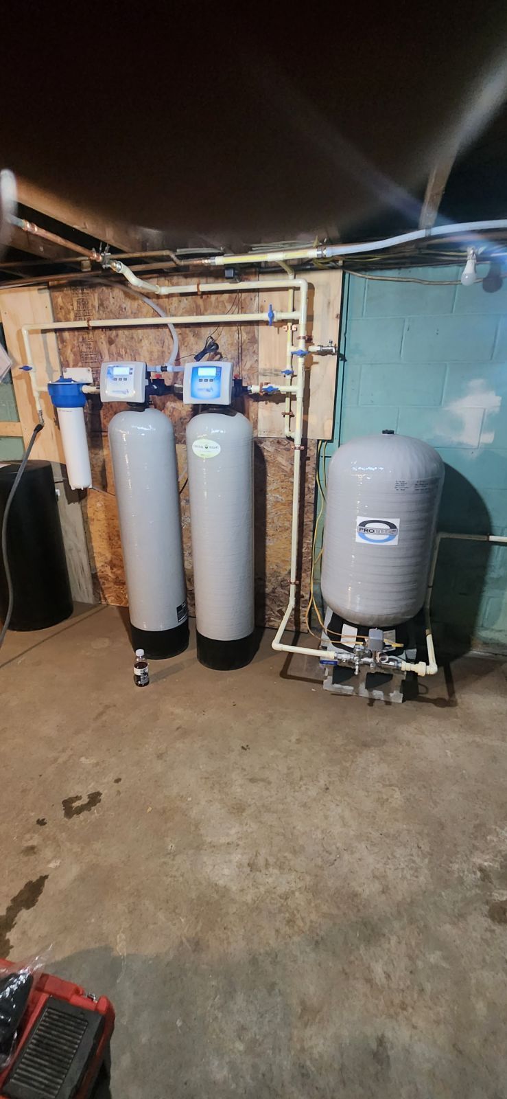 two gray tanks and a Pro Lite pressure tank