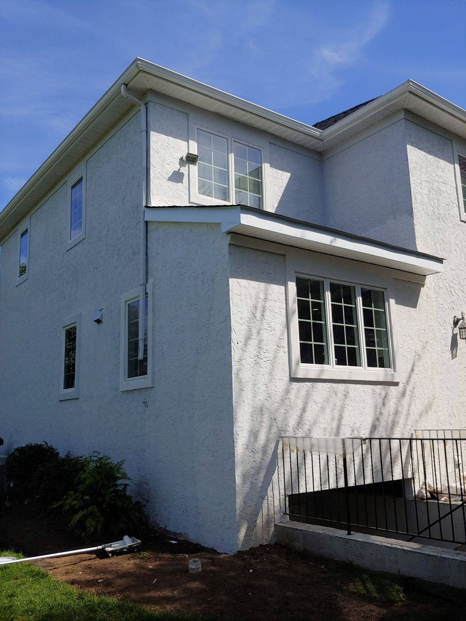 A large white house with a lot of windows