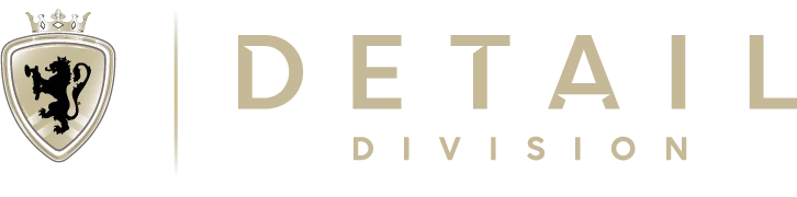 Shield logo and gold text reading “DEI DIVISION” on a white background