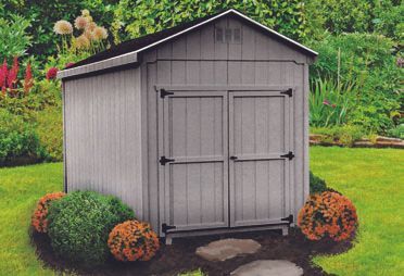 Gray shed with black roof and double doors in a garden setting.