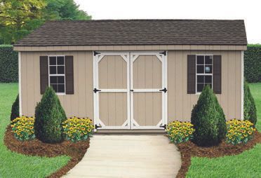 Tan shed with brown roof, double doors, two windows, and dark shutters.