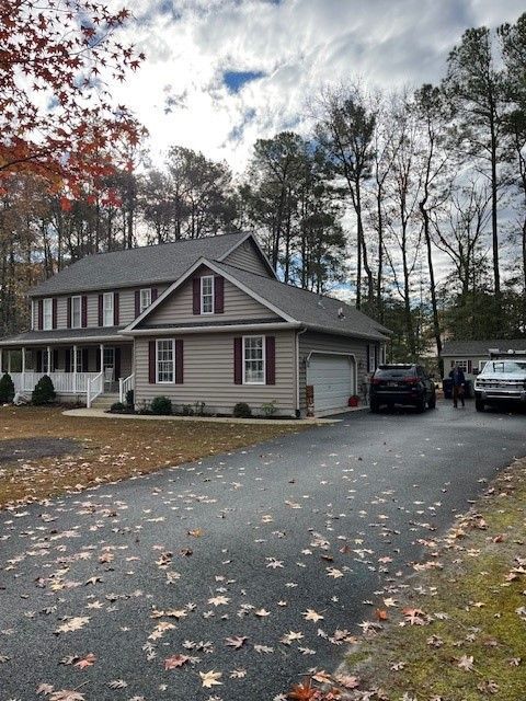 2 story house with driveway