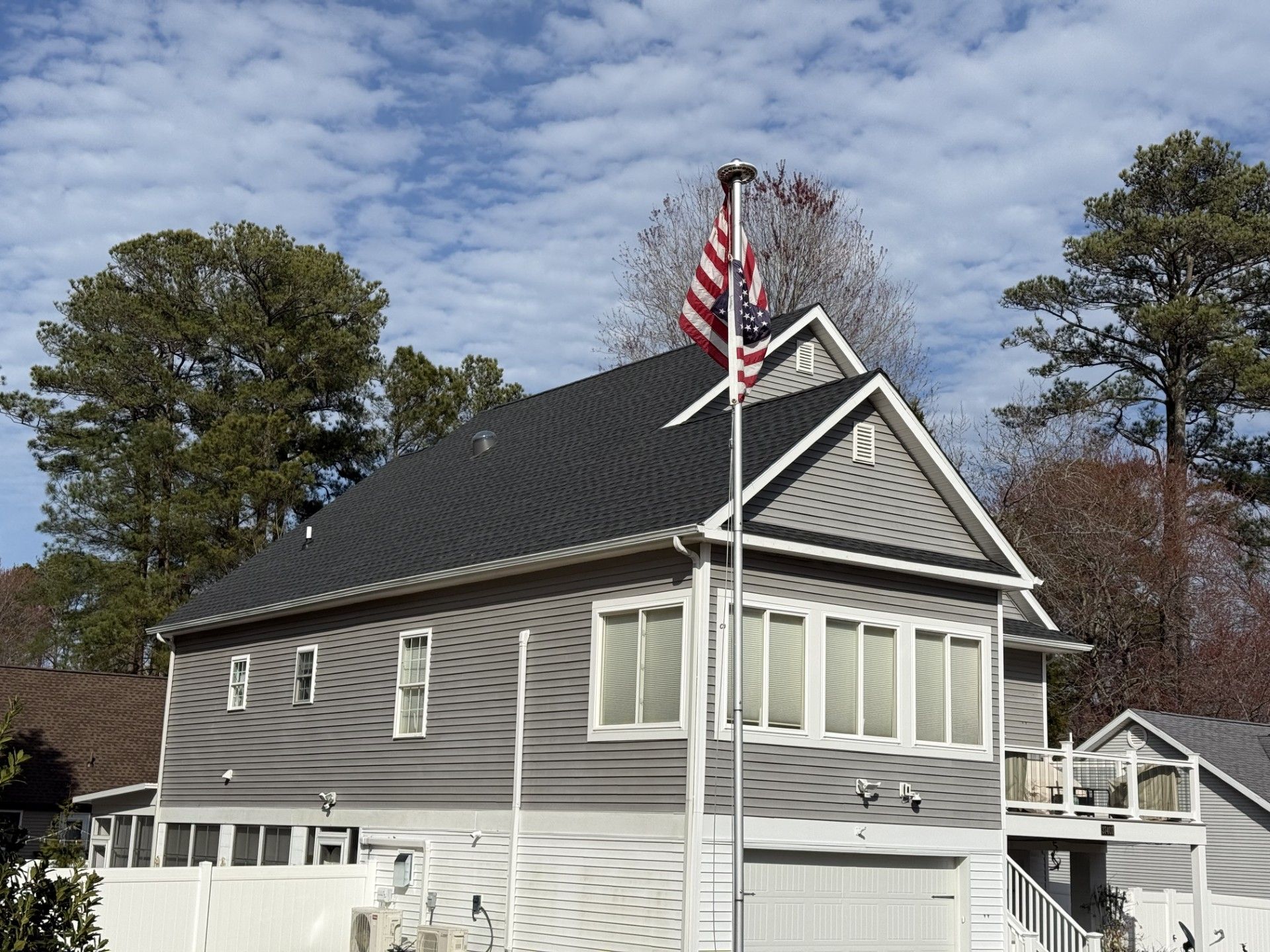 A house with a flag on top of it.
