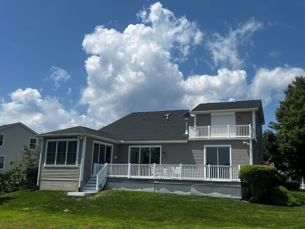 The back of a house with a large deck