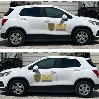 Two white SUVs with Storm Shield logos. The lower car has darker tinted windows.