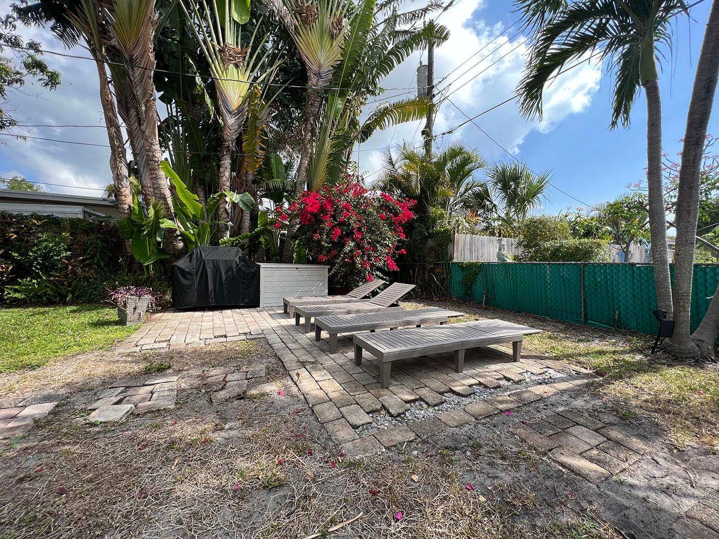 Damaged pavers in a backyard