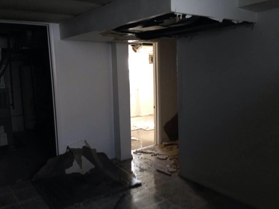 An empty room with a door that is open