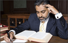 Lawyer studying a book