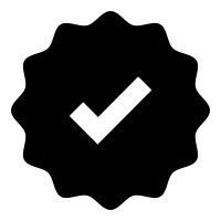 Black badge icon with a white check mark and scalloped edge
