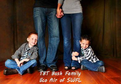 Three people in jeans sit and stand on a wooden floor against a dark backdrop, with text reading “TBT Bush Family Eco Air of SWFL.”