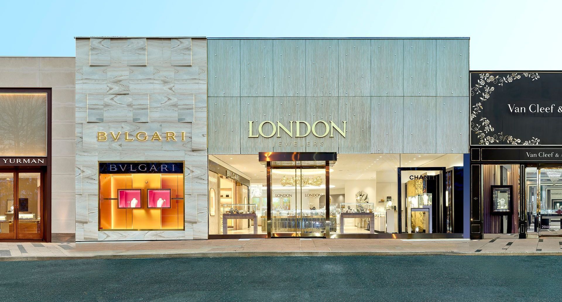 Exterior view of luxury boutiques, including Bulgari and Van Cleef & Arpels, in London.