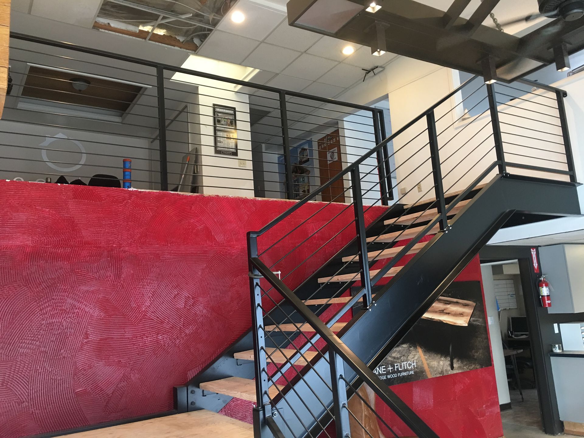 A staircase leading up to the second floor of a building