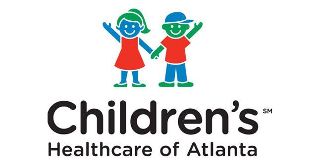 The children 's healthcare of atlanta logo has two children holding hands