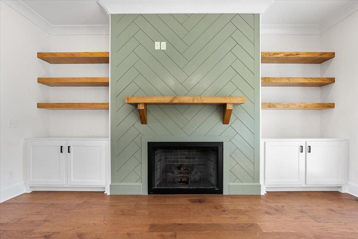 Fireplace with green backsplash